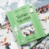 Jigsaw puzzle box titled 'Verbier Vacation' with scattered pieces on a snowy background