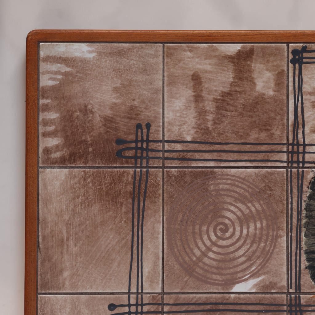 Close up of the geometrically designed tiles of a 1970's Vintage Ox Art Coffee Table