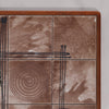 A close up of the geometrically designed tiles of a 1970's Vintage Ox Art Coffee Table