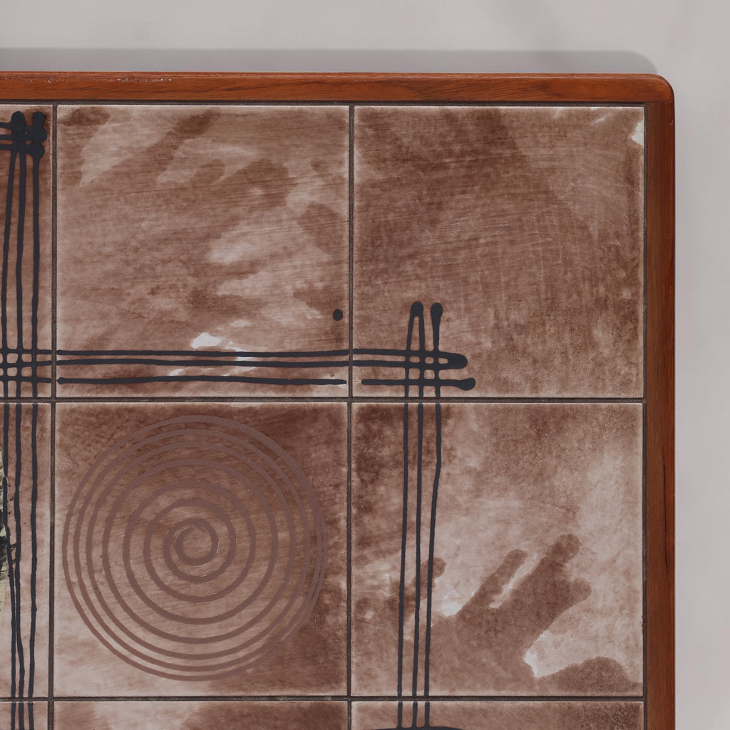 A close up of the geometrically designed tiles of a 1970's Vintage Ox Art Coffee Table