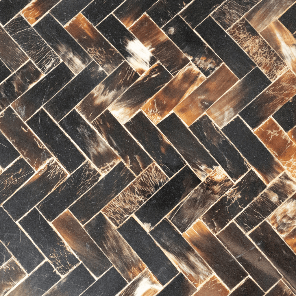 Herringbone pattern of dark and light brown rectangular tiles.