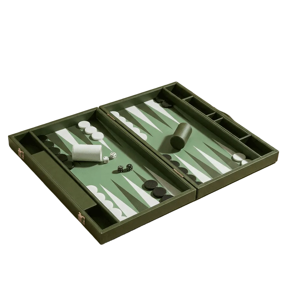 Green backgammon set on a beige surface