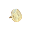 Gold ring with a textured surface on a white background