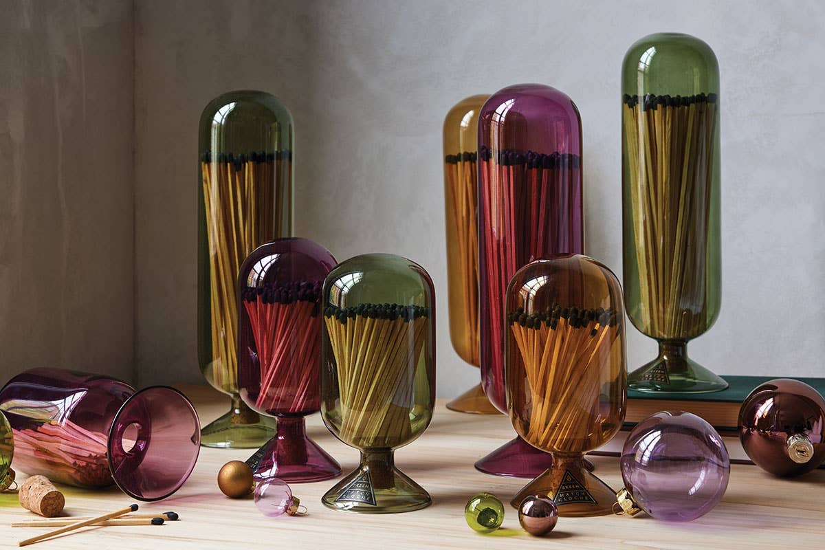 Glass jars filled with matches.