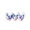 Blue and white ceramic wavy bowl on a pink background
