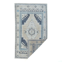 Decorative rug with geometric pattern on a white background