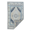 Decorative rug with geometric pattern on a white background
