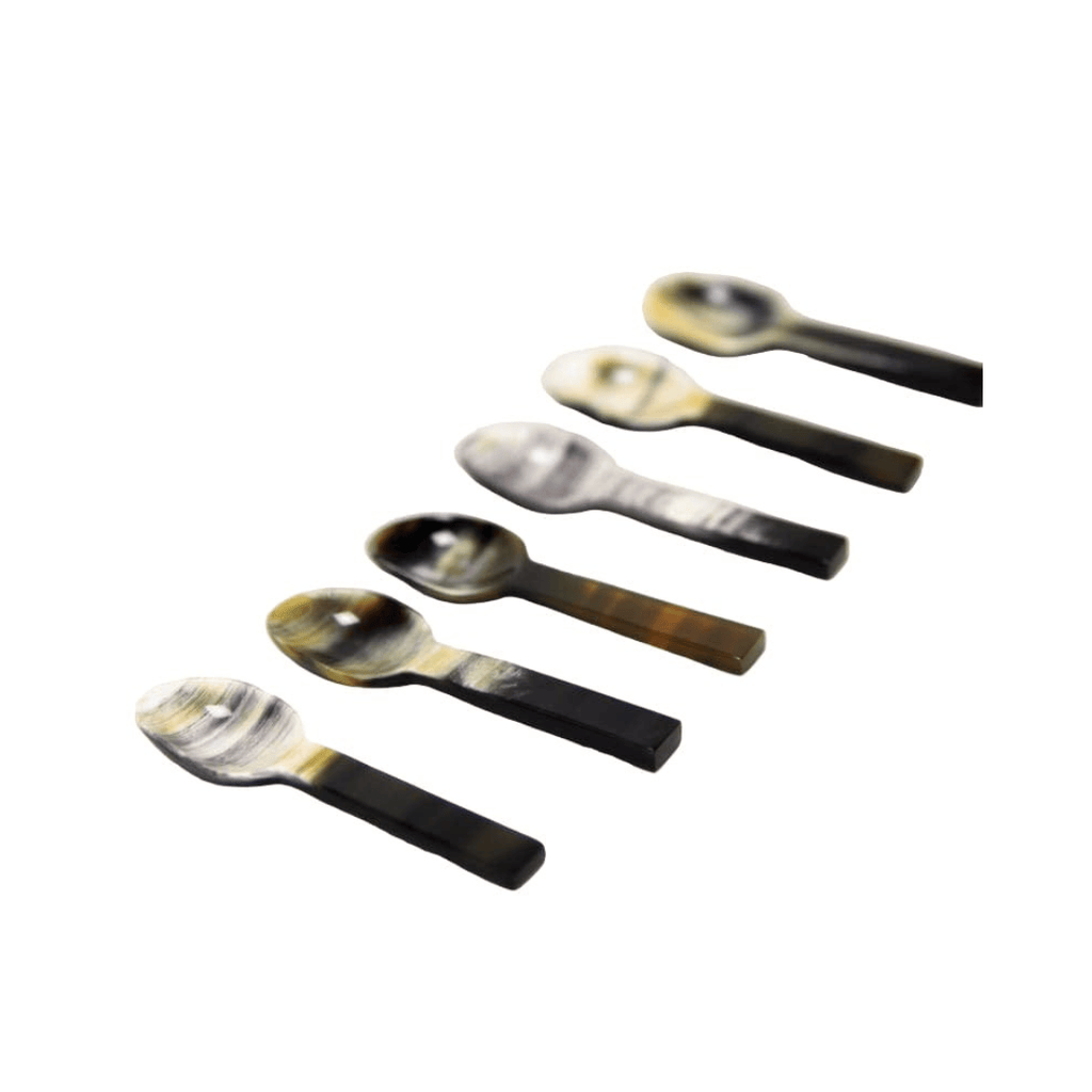 small salt spoons on a white background