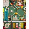A flat-lay collage of tennis-themed items on a green background, including two vintage-style tennis rackets, tennis balls, shoes, a trophy, cups, stickers, and branded packaging. Visible brands include Donny, Wilson, and Penney.