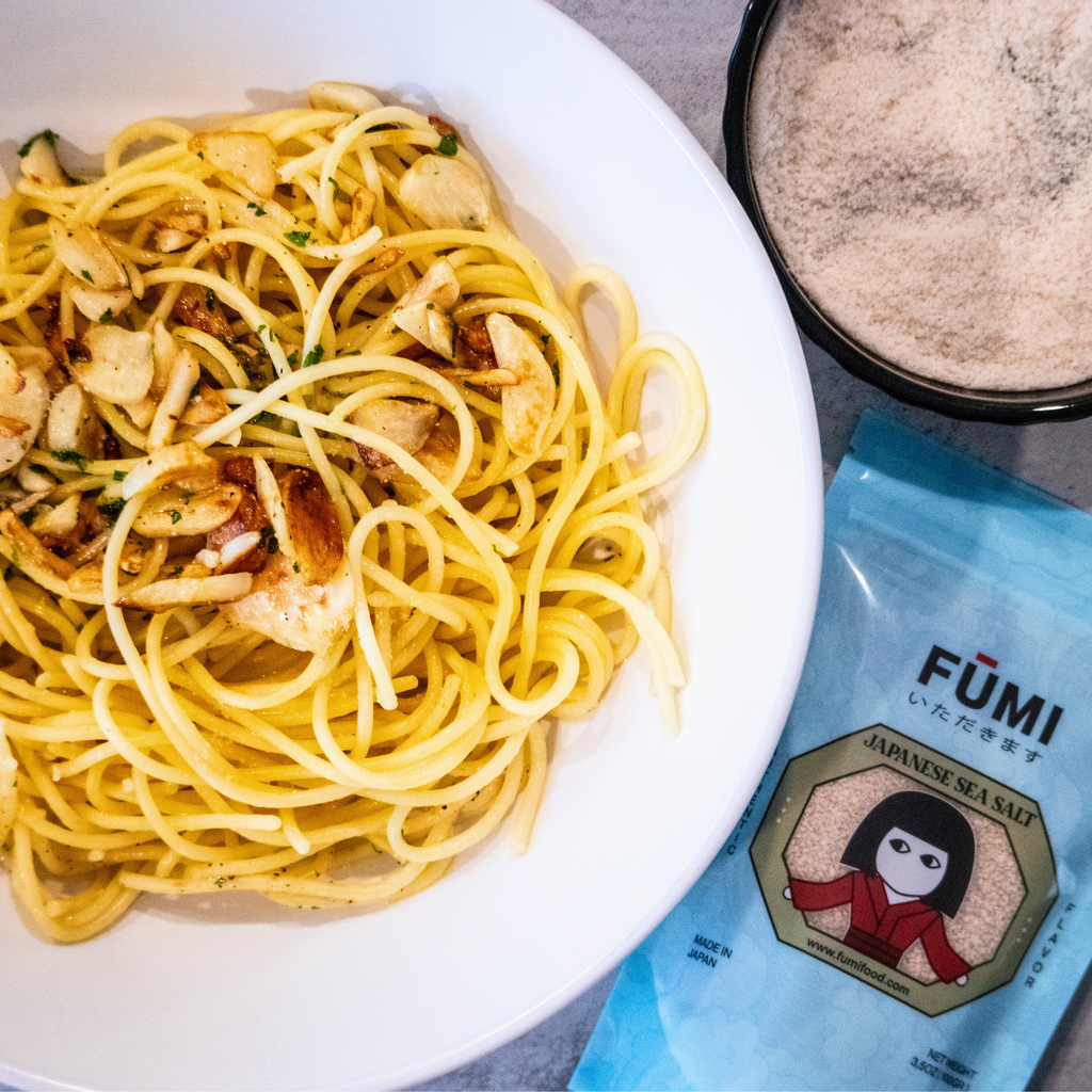 FUMI Japanese Sea Salt package with a bowl full of spaghetti 