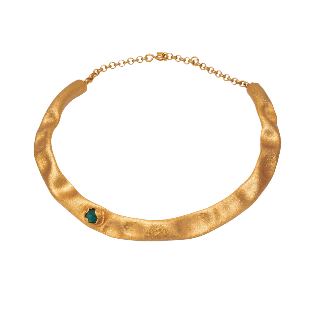 a gold plated choker with a raw emerald and chain