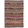 Wave patterned Turkish Kilim rug in wool, featuring brown, salmon, pink, and off-white tones.