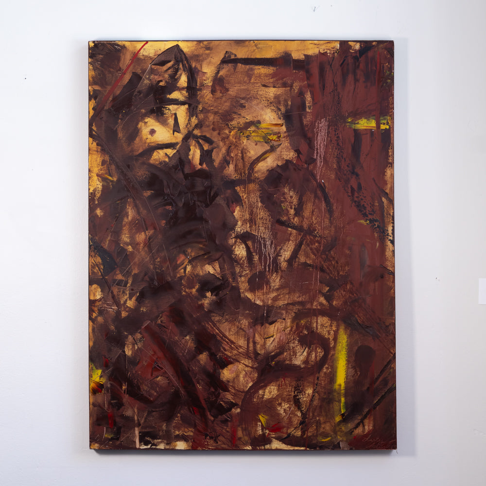 An abstract expressionist painting featuring a complex composition of dark brown, black, ochre gold, and subtle red and yellow accents, mounted on a plain white wall.