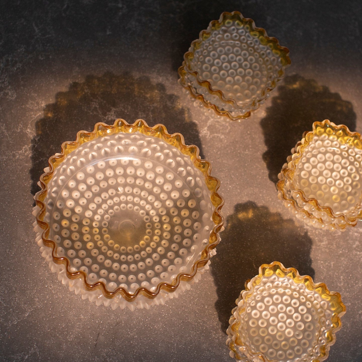 Decorative glass bowls with textured design.