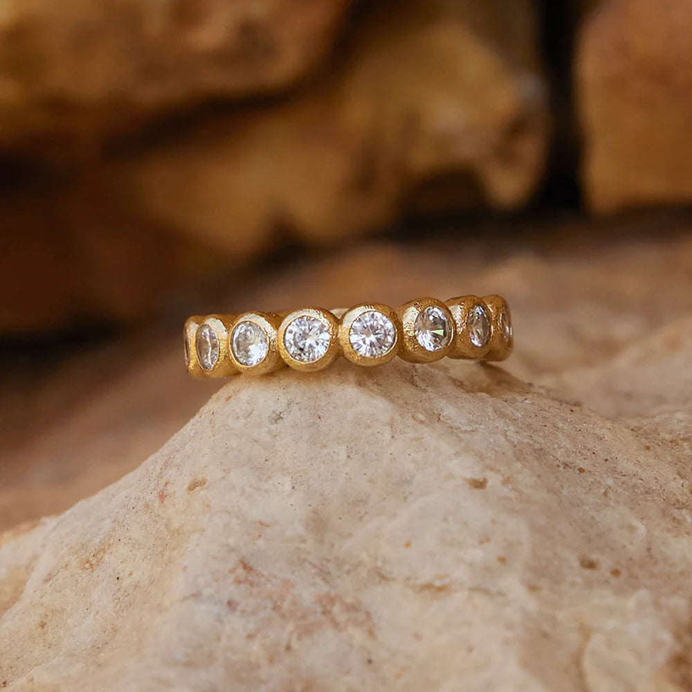 Gold band with diamonds