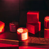 NUEVE LEONES Candles - many displayed together