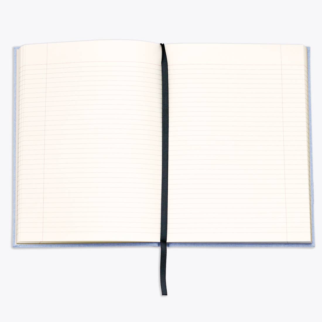 Open notebook with lined pages on a white background