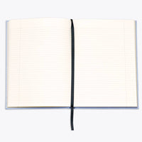 Open notebook with lined pages on a white background