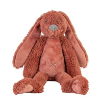 Plush brown bunny toy on a white background