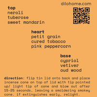 An orange square card with black text listing spice blend ingredients and directions, plus a QR code and the website dilohome.com.