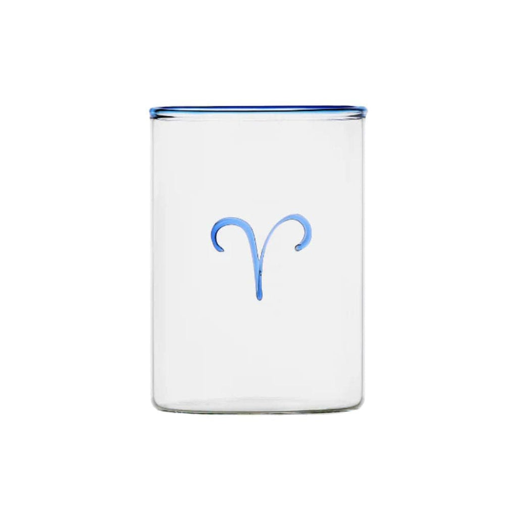 White tumbler with blue rim and blue Aries symbol on a white background modern nomad home decor store denver colorado CO