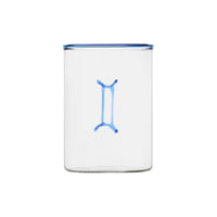 clear glass tumbler with blue rim and blue gemini symbol modern nomad home decor store denver colorado CO