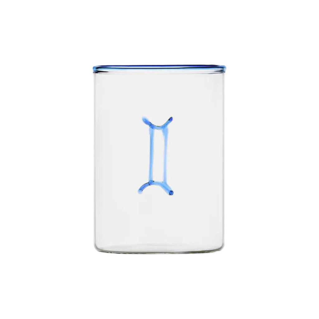 clear glass tumbler with blue rim and blue gemini symbol modern nomad home decor store denver colorado CO