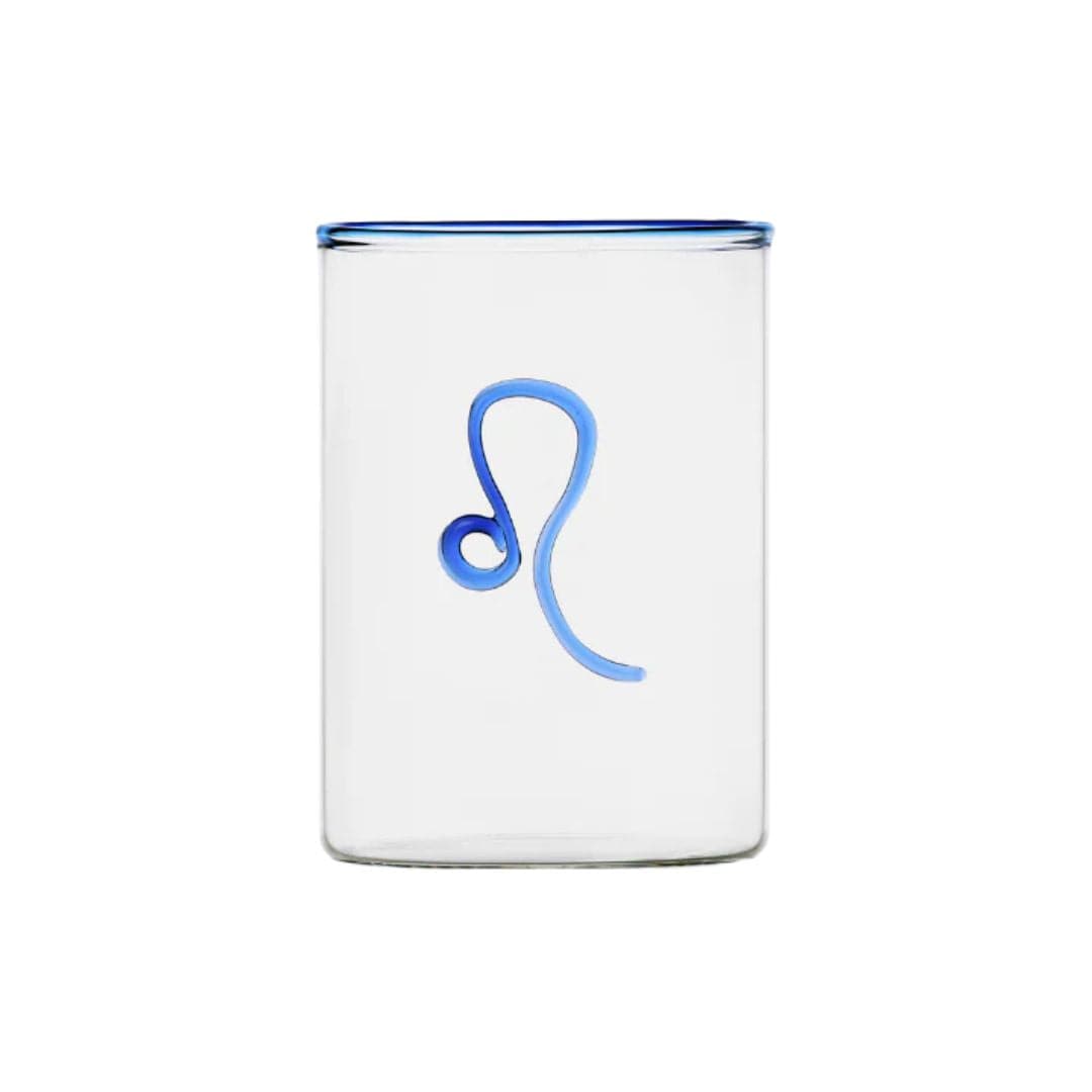 clear glass tumbler with blue rim and blue Leo symbol modern nomad home decor store denver colorado CO
