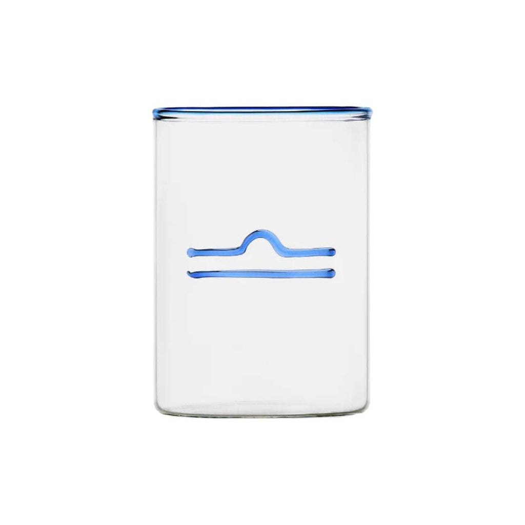 clear glass tumbler with blue rim and blue libra symbol modern nomad home decor store denver colorado CO