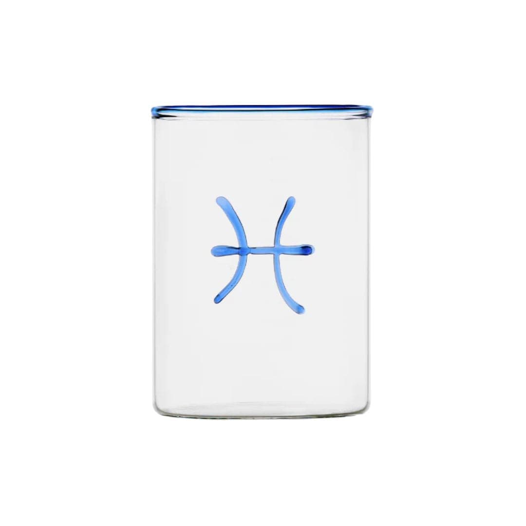 clear glass tumbler with blue rim and blue pisces symbol modern nomad home decor store denver colorado CO