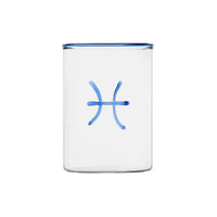 clear glass tumbler with blue rim and blue pisces symbol modern nomad home decor store denver colorado CO