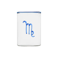 clear glass tumbler with blue rim and blue virgo symbol modern nomad home decor store denver colorado CO