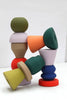  Stacks – Tomato Candlestick Holder in a variety of colors stacked on top of each other 