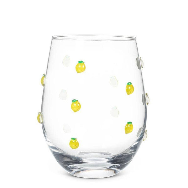 Clear glass with lemon designs on a white background