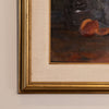 Close-up of a framed still life painting showing part of a gold ornate frame, cream mat board, and dark brown painted canvas with orange fruit details.
