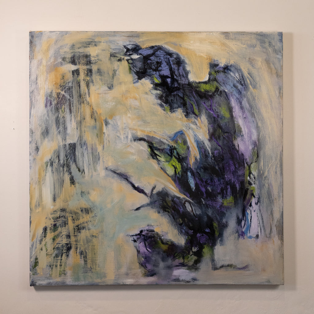 An abstract canvas painting featuring expressive brushstrokes in deep purple, black, yellow, and gray on a light beige background, mounted on a neutral wall.