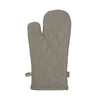 A single quilted oven mitt in a textured taupe-gray fabric, featuring a diamond-quilted pattern and a small woven brand tag on the side, set against a plain white background.