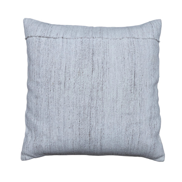 A square throw pillow in a textured light gray linen-like fabric, displayed flat on a rustic gray wooden plank surface.