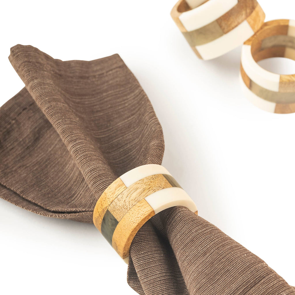 Travis Napkin Rings (set of 6) displayed with a brown napkin 