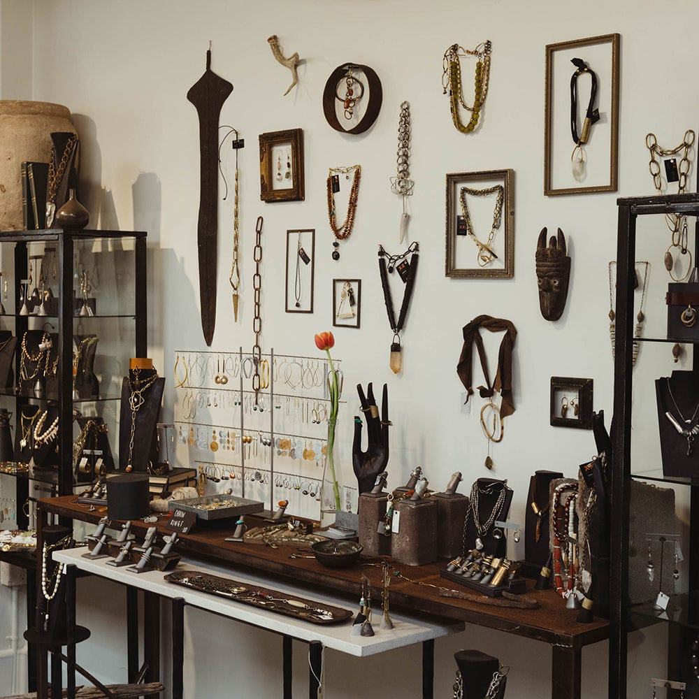 Jewelry display featuring necklaces, earrings, and Two-Kisses-Jewelry-2.