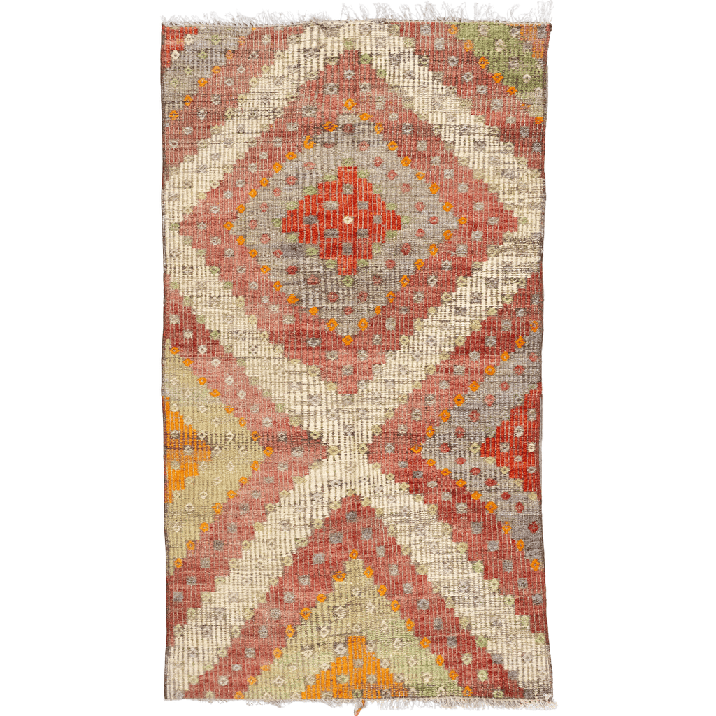 Handwoven wool Turkish Kilim rug with diamond pattern in sage green, red, light blue, orange, and off-white.