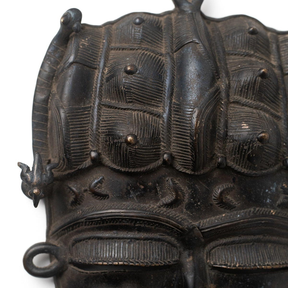 Senufo lost-wax cast bronze mask – aged patina detail