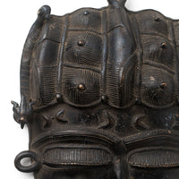 Senufo lost-wax cast bronze mask – aged patina detail