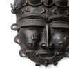 Vintage African bronze mask from Ivory Coast – reverse view