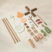 Set of wooden toys on a light beige background