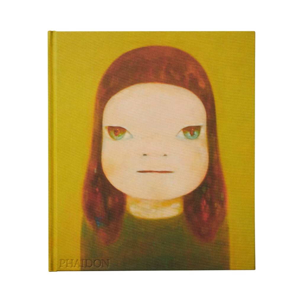 A hardcover art book by Phaidon featuring a stylized portrait of a child with reddish-brown hair and green eyes on a mustard yellow background.