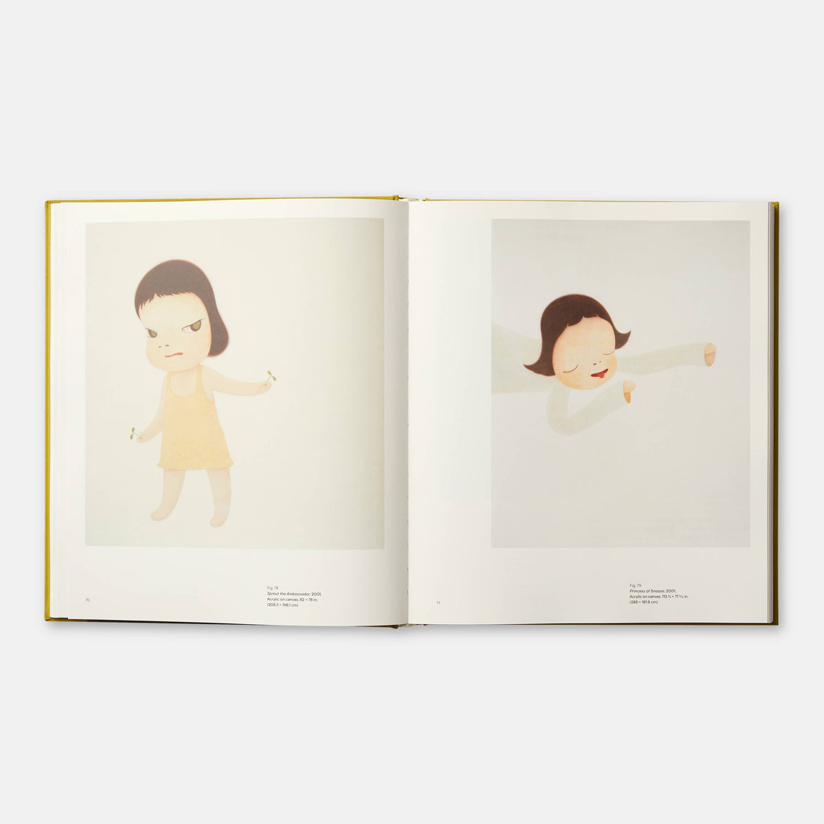 Open book with illustrations of a child in a yellow dress on a white background