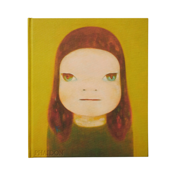 A hardcover art book by Phaidon featuring a stylized portrait of a child with reddish-brown hair and green eyes on a mustard yellow background.