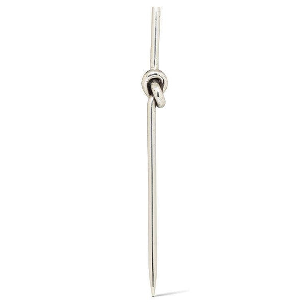 Silver cocktail pick on a white background