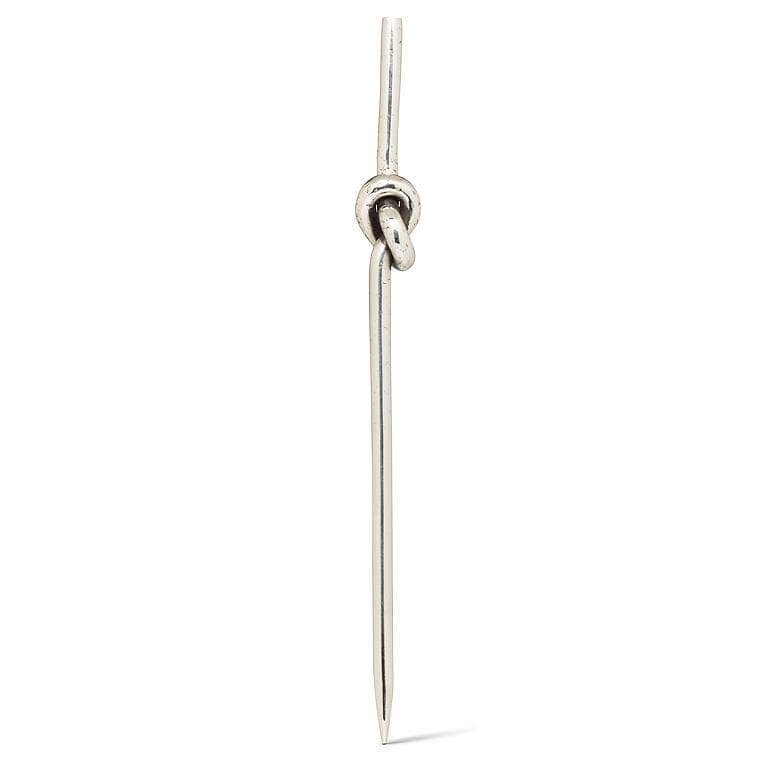 Silver cocktail pick on a white background